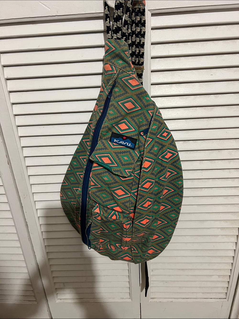 Kavu Green Aztec-Print Sling Bag with Orange Accents